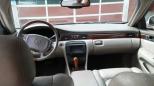 03 Cadillac sets pearl white. All leather GPS in dash. Northstar v-8 160k . good